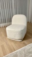 Fauteuil pivotant blanc, en tissu « bouclette »